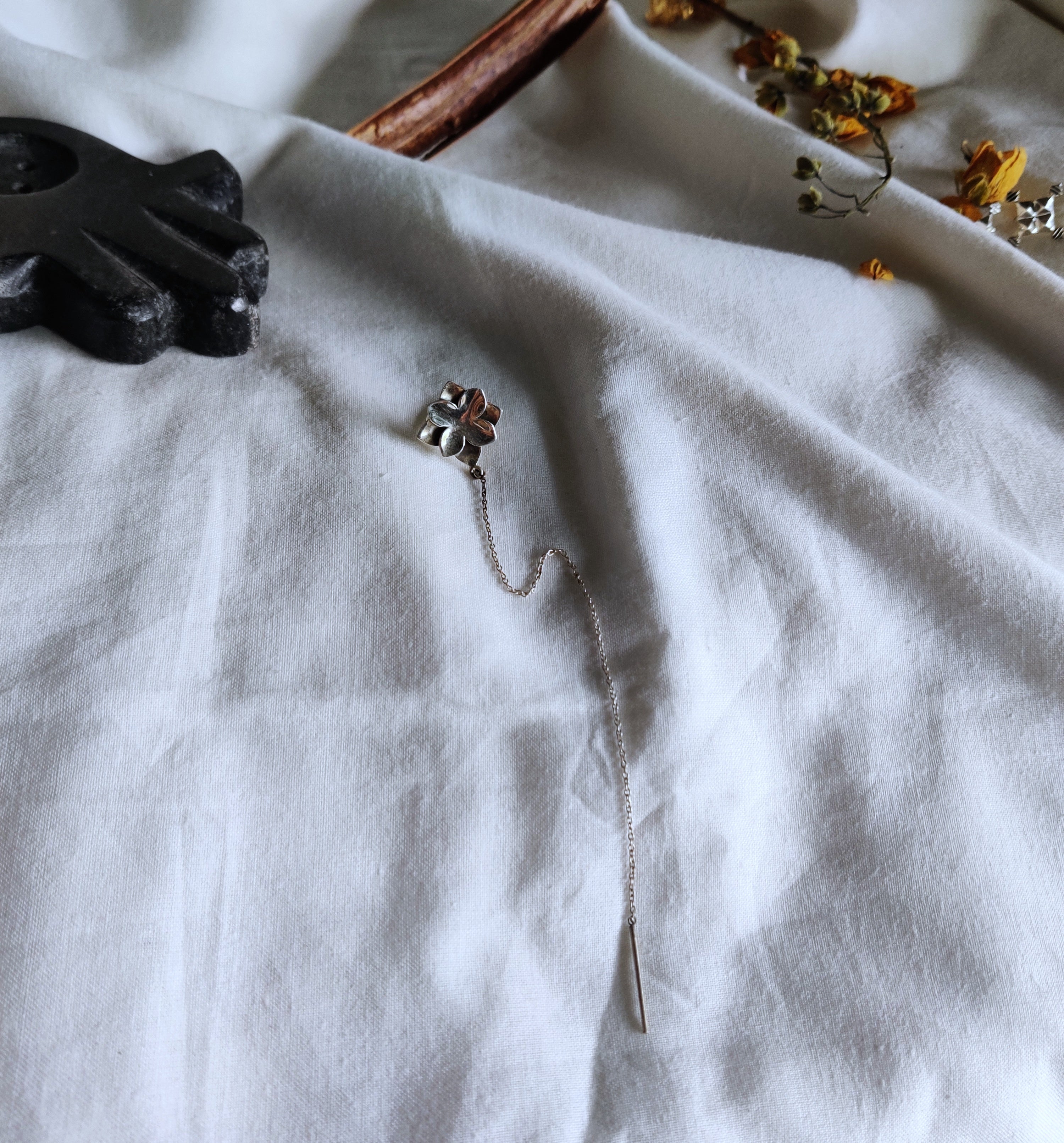 Kumud ear clip on a long chain
